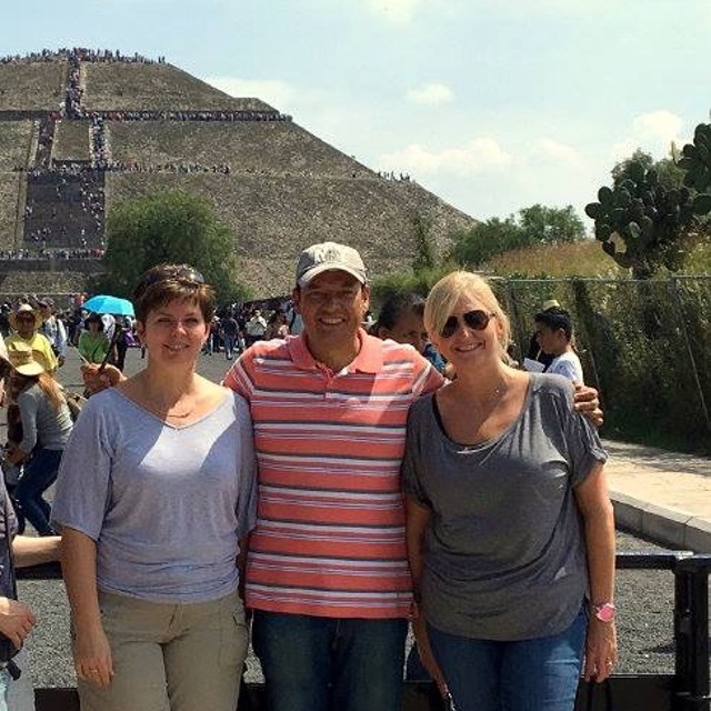 pyramids in mexico guide javier with happy clients